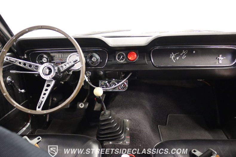 Unknown-Mustang-1965-Rangoon-Red-Black-44