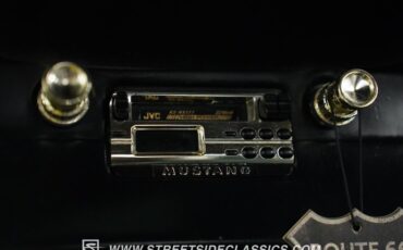Unknown-Mustang-1965-Springtime-Yellow-Black-40