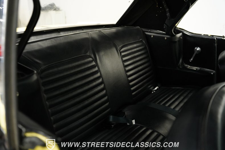 Unknown-Mustang-1965-Springtime-Yellow-Black-43
