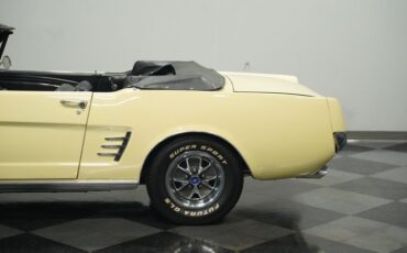 Unknown-Mustang-1966-Spring-Time-Yellow-Black-26