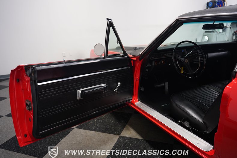 Unknown-Road-runner-1969-Barracuda-Orange-Black-46