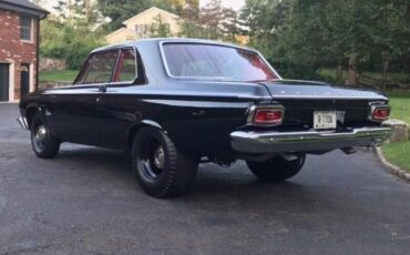 Unknown-Savoy-1964-Black-Red-2