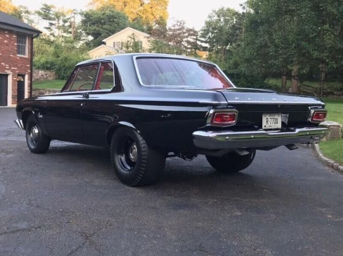 Unknown-Savoy-1964-Black-Red-2