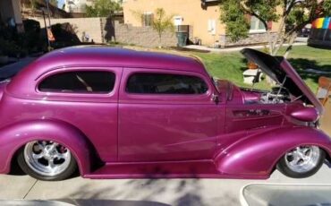 Unknown-Sedan-1937-Magenta-MagentaBeige-Leathe