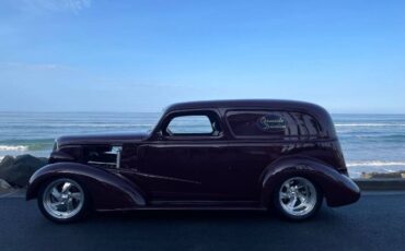 Unknown-Sedan-1937-Maroon-Tan