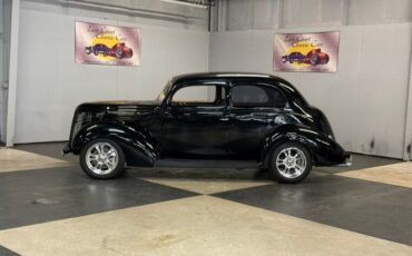 Unknown-Sedan-1938-Black-Brown