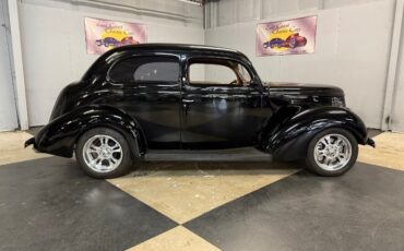 Unknown-Sedan-1938-Black-Brown-39