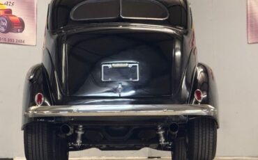 Unknown-Sedan-1938-Black-Brown-4