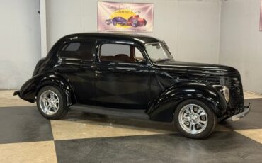 Unknown-Sedan-1938-Black-Brown-40