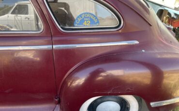 Unknown-Sedan-1942-Maroon-Tan-6