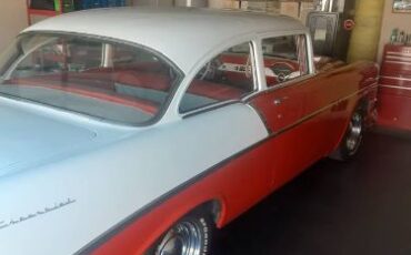 Unknown-Sedan-1956-RedWhite-2