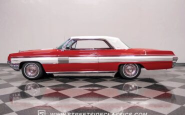 Unknown-Starfire-1962-Chariot-Red-Red