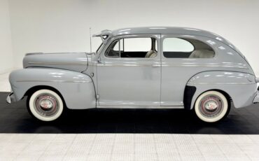 Unknown-Super-deluxe-1946-Feather-Gray-White