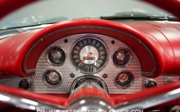 Unknown-Thunderbird-1957-Raven-Black-Flame-Red-41