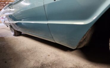 Unknown-Thunderbird-1964-TealWhite-Teal-11