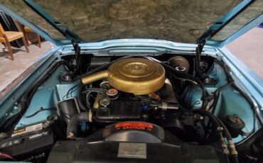 Unknown-Thunderbird-1964-TealWhite-Teal-14