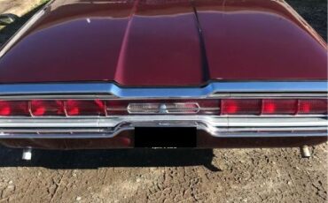 Unknown-Thunderbird-1966-Burgundy-Black-2