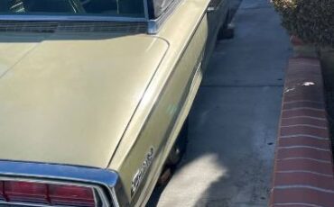 Unknown-Thunderbird-1966-Gold-Metallic-Gold-Leather