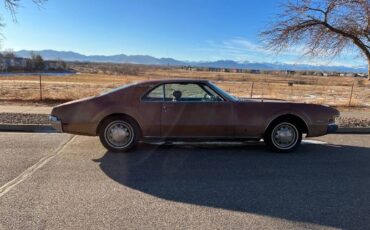 Unknown-Toronado-1966-Red