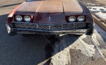 Unknown-Toronado-1966-Red-9