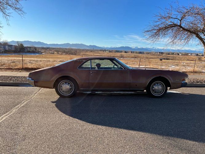Unknown-Toronado-1966-Red
