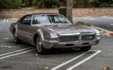Unknown-Toronado-1969-Electric-Candy-Silve-Black-21