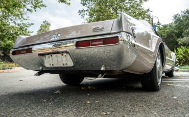Unknown-Toronado-1969-Electric-Candy-Silve-Black-26