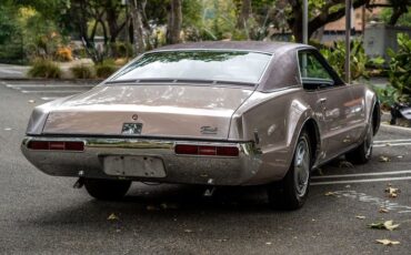 Unknown-Toronado-1969-Electric-Candy-Silve-Black