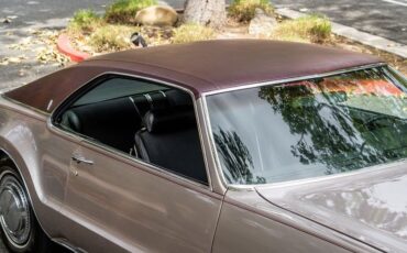 Unknown-Toronado-1969-Electric-Candy-Silve-Black-49
