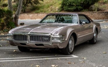 Unknown-Toronado-1969-Electric-Candy-Silve-Black-6
