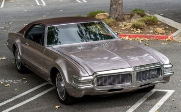 Unknown-Toronado-1969-Electric-Candy-Silve-Black-9