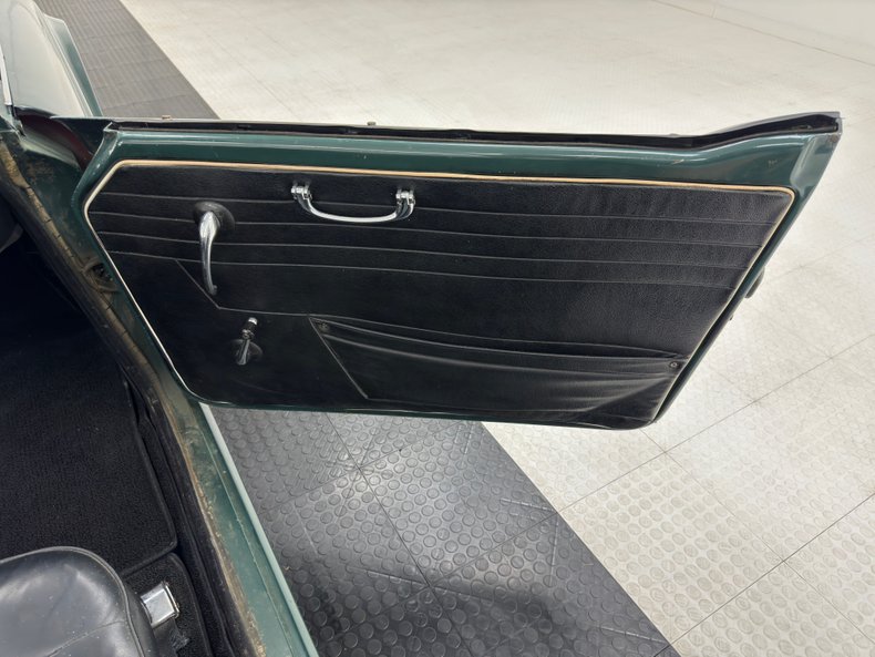 Unknown-Tr4-1964-British-Racing-Green-Black-35