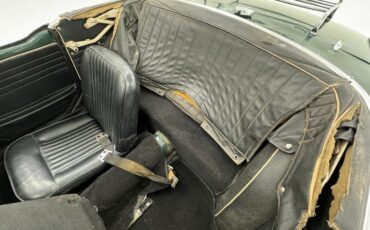 Unknown-Tr4-1964-British-Racing-Green-Black-38