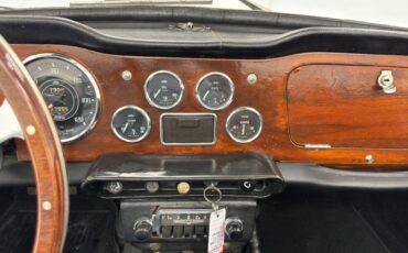 Unknown-Tr4-1964-British-Racing-Green-Black-45