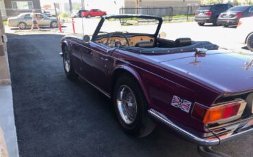 Unknown-Tr4a-1974-Burgundy-Black-7