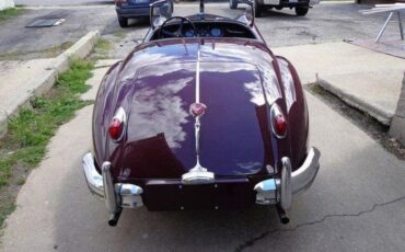 Unknown-Xk140-1955-MaroonBlack-Top-Black-Leather-10