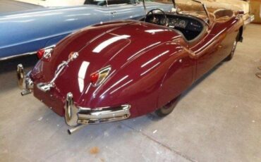 Unknown-Xk140-1955-MaroonBlack-Top-Black-Leather-14