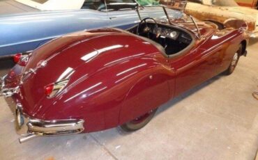 Unknown-Xk140-1955-MaroonBlack-Top-Black-Leather-16