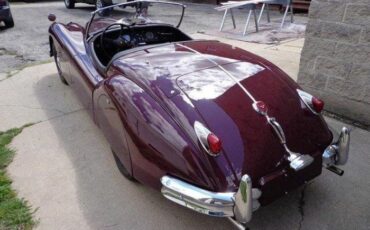 Unknown-Xk140-1955-MaroonBlack-Top-Black-Leather-17