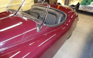 Unknown-Xk140-1955-MaroonBlack-Top-Black-Leather-18