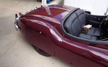 Unknown-Xk140-1955-MaroonBlack-Top-Black-Leather-3