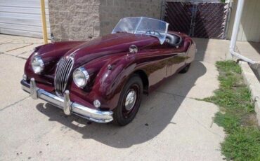 Unknown-Xk140-1955-MaroonBlack-Top-Black-Leather