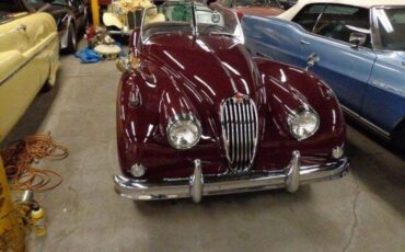Unknown-Xk140-1955-MaroonBlack-Top-Black-Leather-4