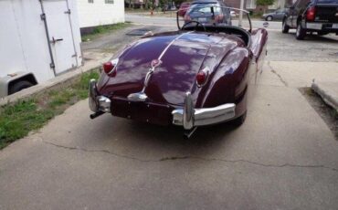 Unknown-Xk140-1955-MaroonBlack-Top-Black-Leather-5