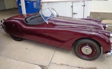 Unknown-Xk140-1955-MaroonBlack-Top-Black-Leather-6
