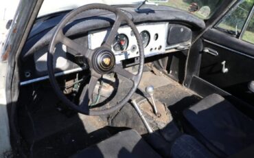 Unknown-Xk150-1960-White-Black-2