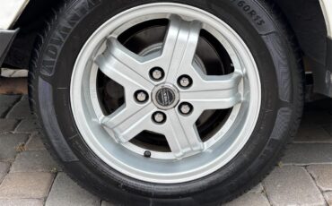 Volvo-240-1988-White-Tan-15