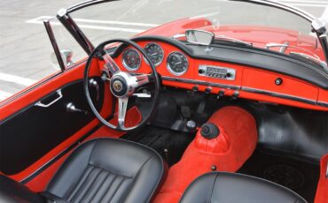 Alfa-romeo-Giulia-spider-veloce-1965-Red-Black-19