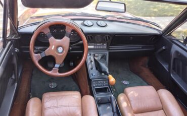 Alfa-romeo-Spider-1989-Burgundy-black-and-tan-13