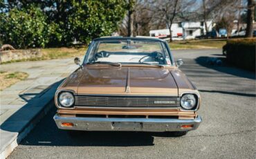 Amc-Rambler-1966-Gold-White-1